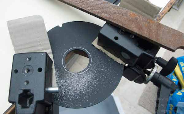 enlarging lens plate hole © Phil Gee